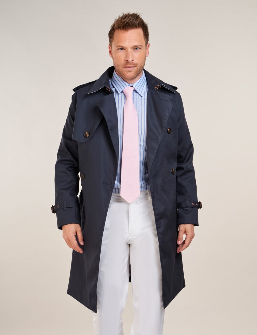 navy trench coat with white trousers 
