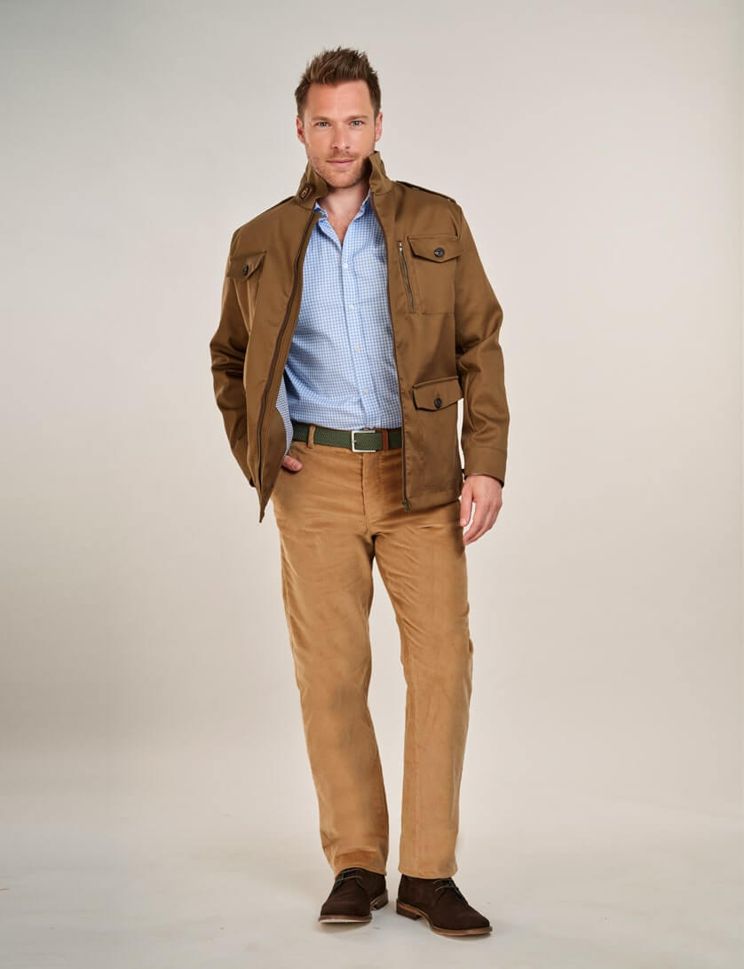 beige corduroy trousers with check shirt and khaki field jacket