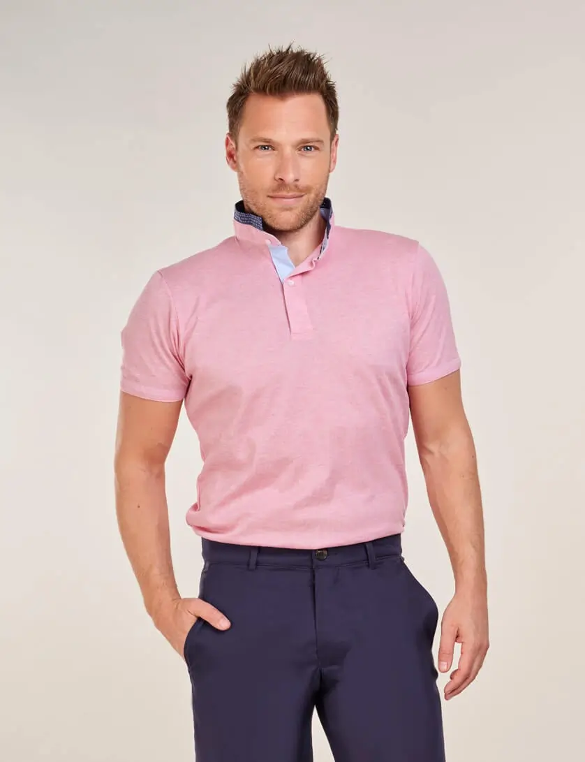 pink polo shirt with navy chinos for men