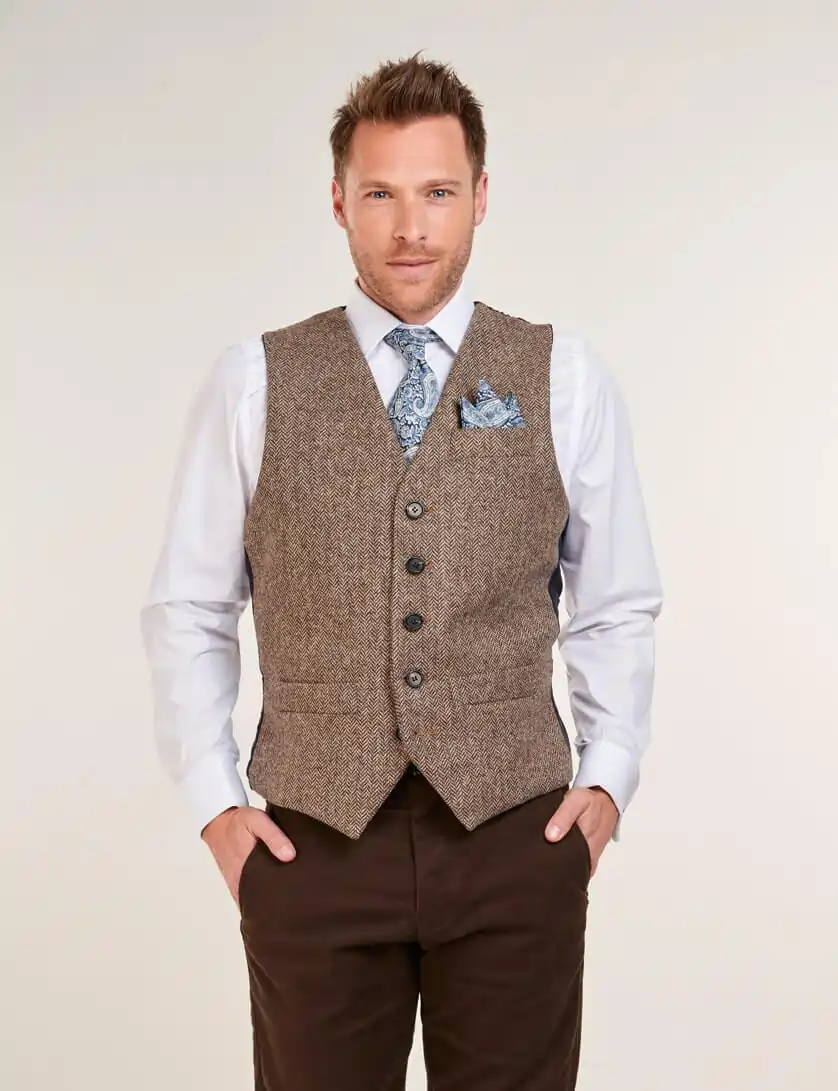 brown moleskin trousers with tweed waistcoat and navy filed jacket