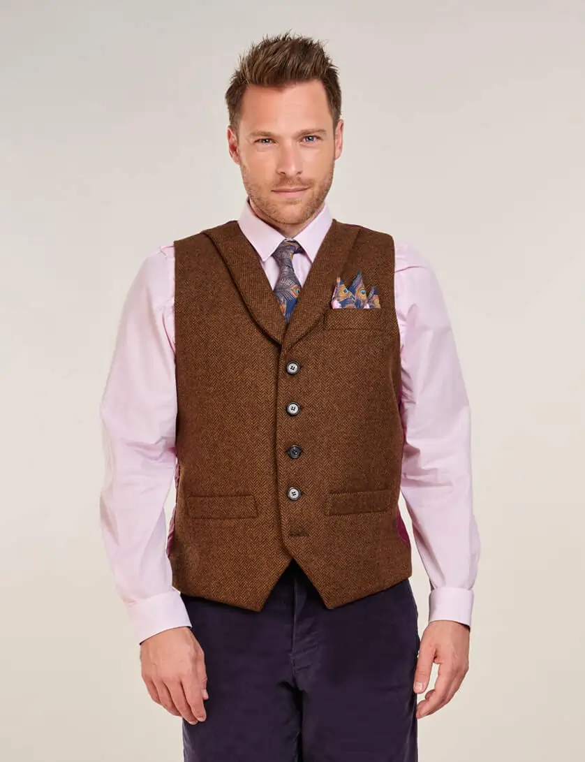 brown herringbone tweed waistcoat with navy cord trousers