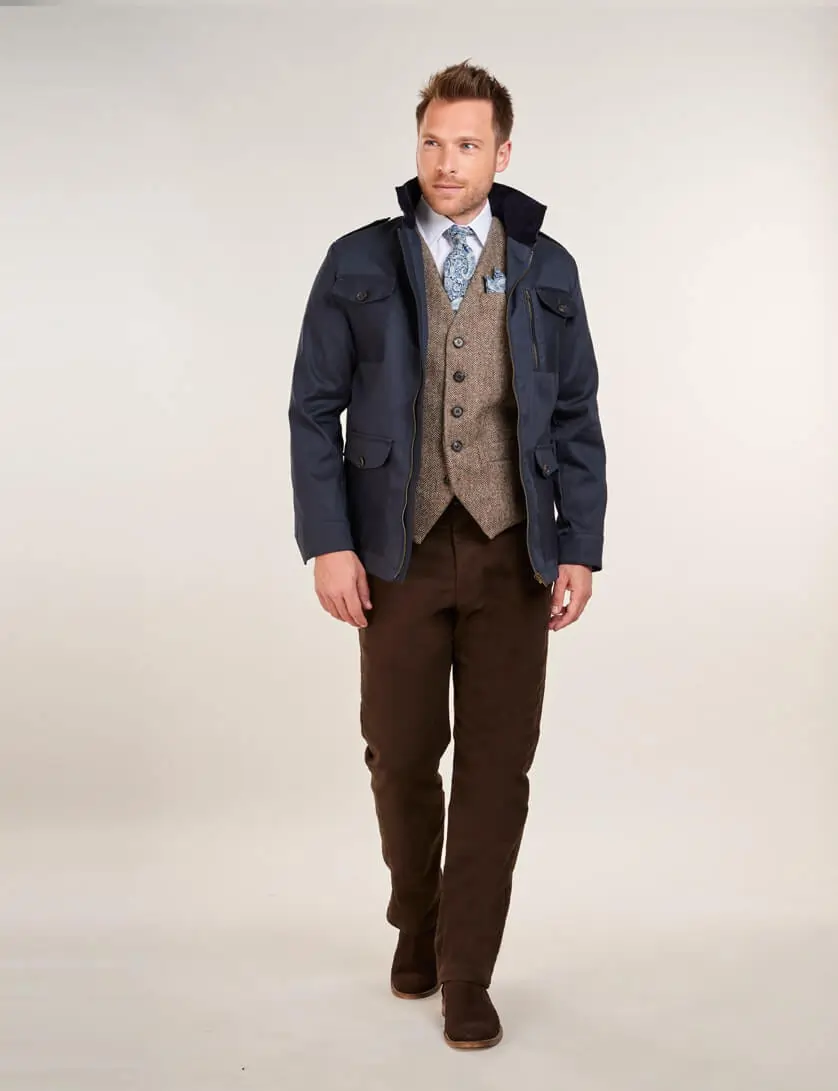 Outfit 1: Make a statement with our brown moleskin trousers complete with white shirt, tweed waistcoat, tie and navy field jacket