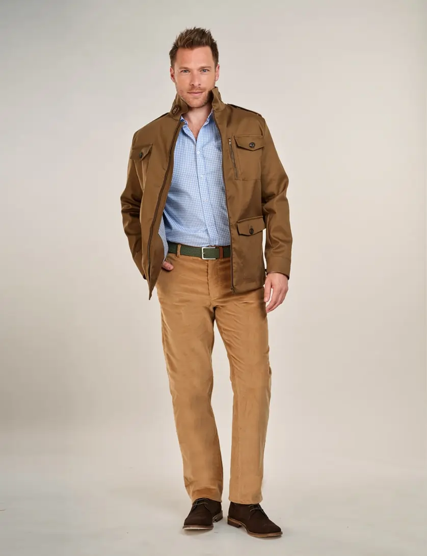 beige corduroy trousers with check shirt and green field jacket